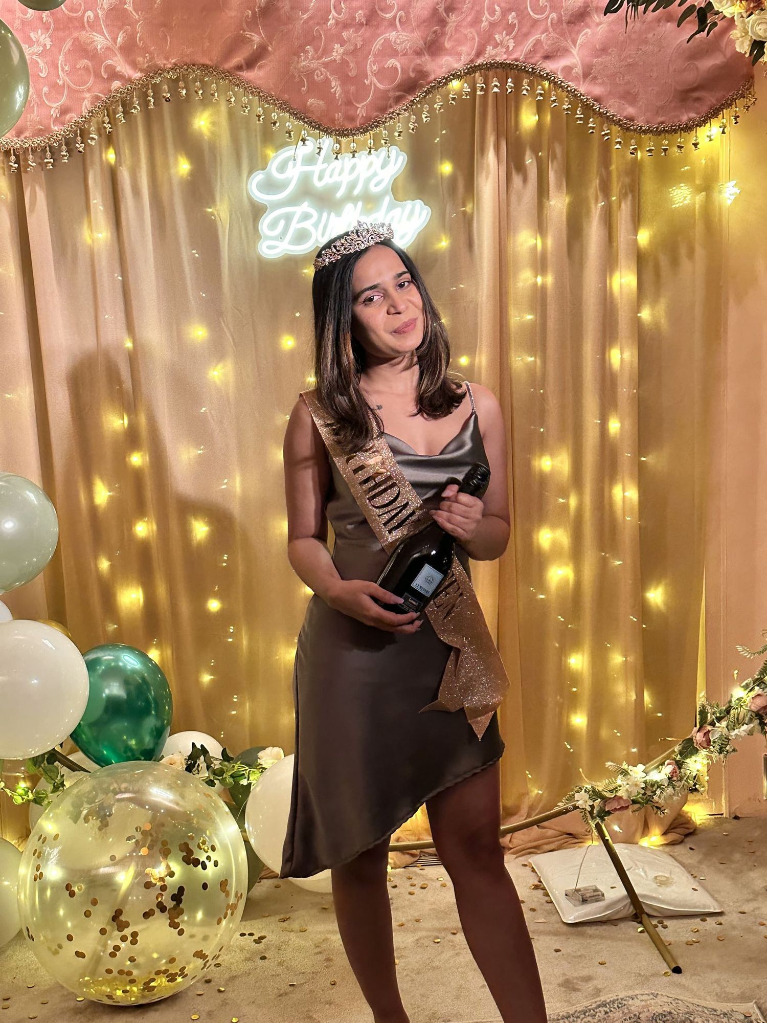 Birthday party décor with balloons and dessert display