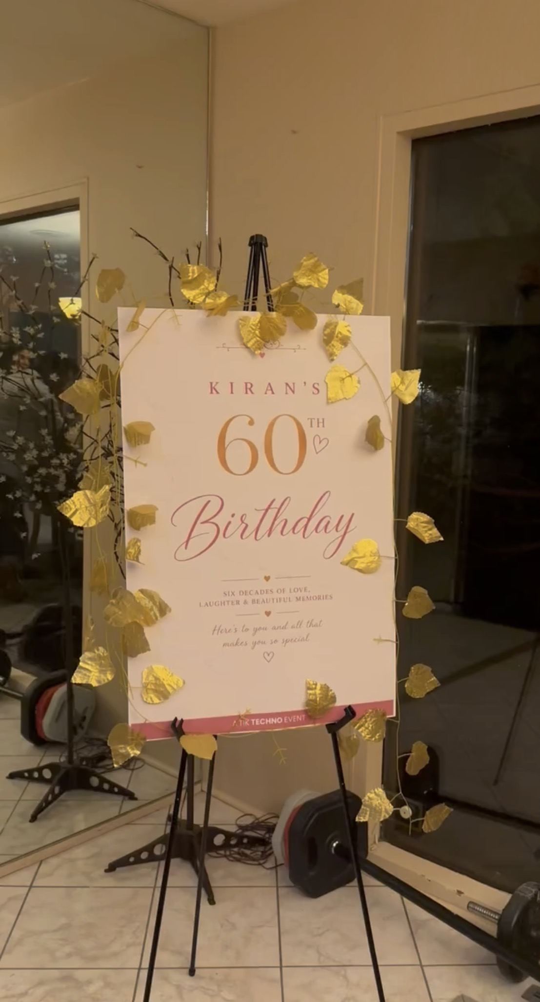 Birthday backdrop with balloon styling and cake table
